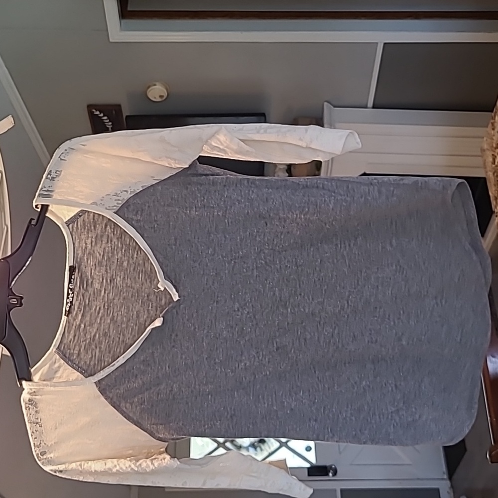 Shirt with burnout sleeves. Make Offer. Bundle and Make Offer.